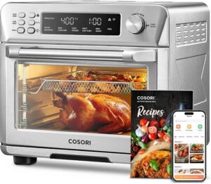 COSORI Smart 11-in-1 Air Fryer Toaster Oven Combo in stainless steel on a modern kitchen countertop.